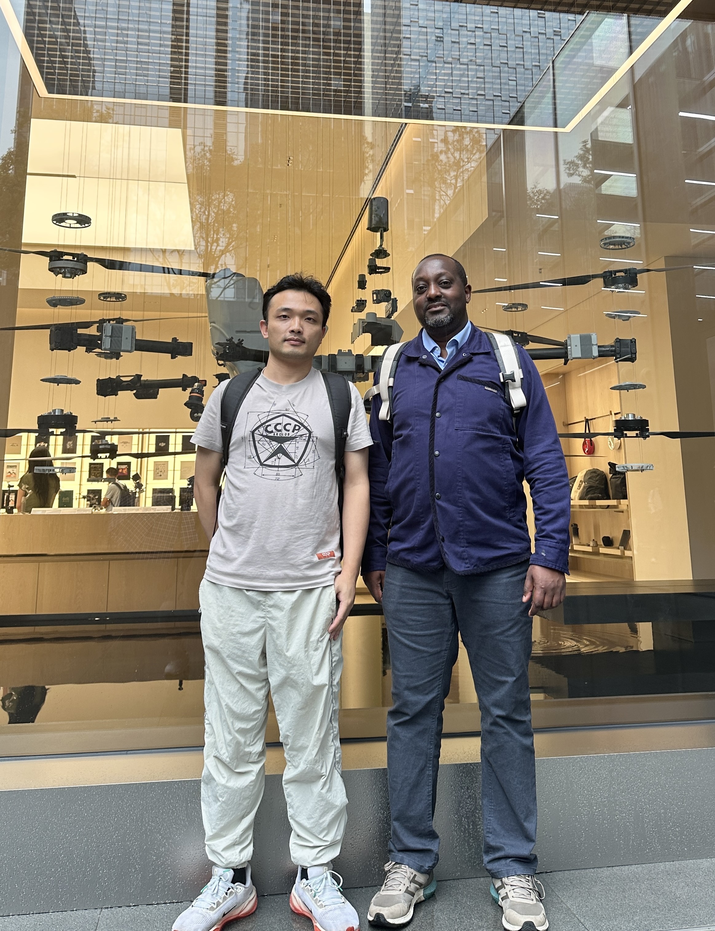 Showing Amos, Editor-in-Chief of Science Robotics, around DJI
